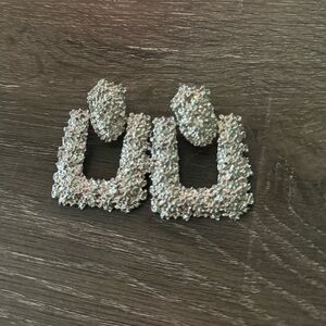 Silver statement earrings